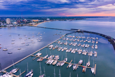 Aerial Image of SUNSET OVER THE ST KILDA PIER MARINA AND BREAKWATER