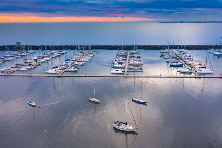 Aerial Image of SUNSET OVER THE ST KILDA PIER MARINA AND BREAKWATER