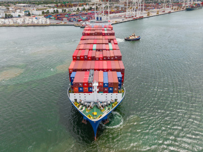 Aerial Image of CARGO SHIP AND TUGBOAT ON YARRA RIVER, WEST MELBOURNE