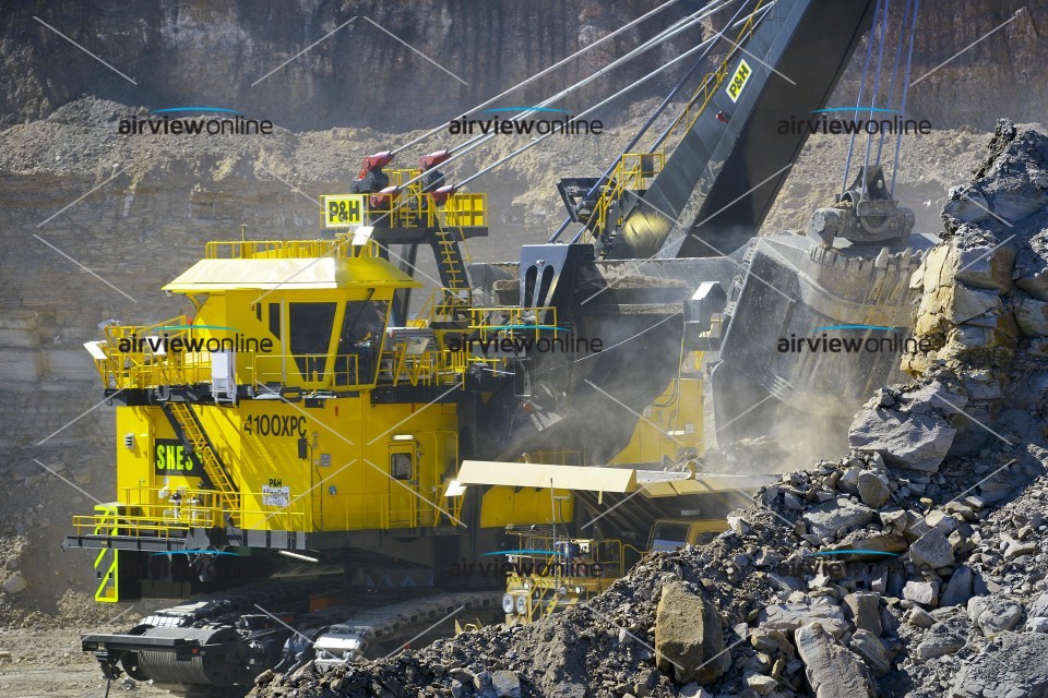 Aerial Image of Mining Shovel unloading into truck